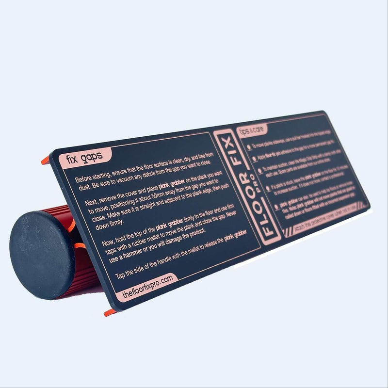 Load image into Gallery viewer, Floor Fix Pro Plank Grabber Plank Grabber is a tool for fixing gaps in floating floors. It features a &quot;Magic Grip Strip&quot; that sticks to the plank you want to move using nano-suction and without leaving any sticky residue. Plank Grabber can be used to fix
